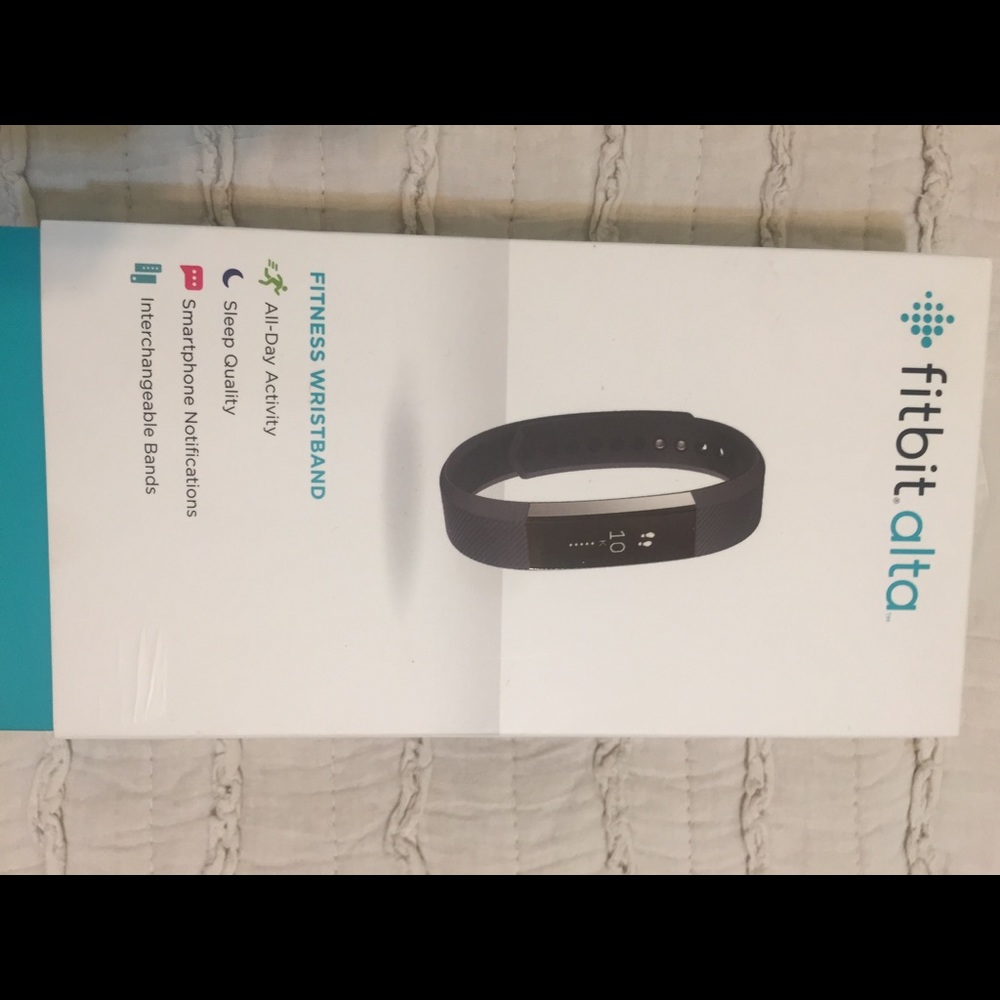 Fitbit Alta. Only set up and worn twice.